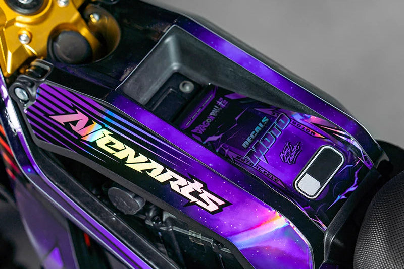 Surron with SURRONCUSTOMS graphics kit applied